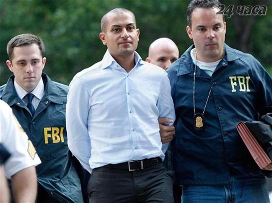 Агенти на ФБР водят Цолов след ареста му в Ню Йорк. СНИМКА: РОЙТЕРС 
