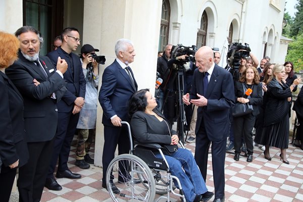 The king talks to the former MP Denitsa Dimitrova.