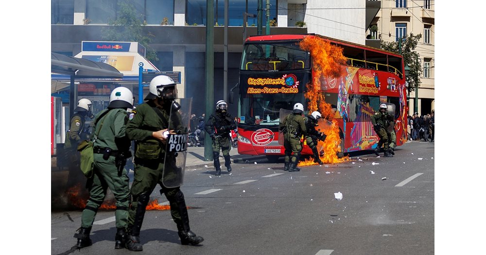 12,000 Greeks fight police in Athens, Mitsotakis begs for forgiveness of charred relatives (Review)