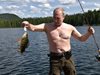 Риболовните подвизи на Путин (Снимки)