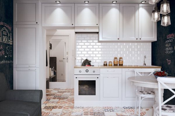 Кухнята е изцяло бяла, а пачуъркът изпъква ярко на нейния фон Снимки design-homes.ru