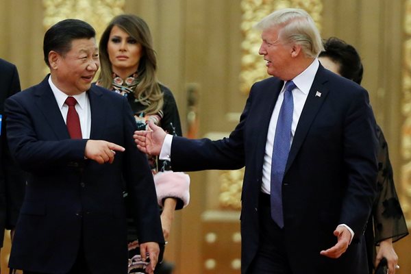 Президентът на САЩ Доналд Тръмп и колегата му от Китай Си Цзинпин  СНИМКА: Ройтерс