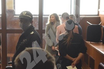 LiLana (center) in court.