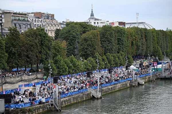 Spectators shivered as they waited for the ceremony to begin Photo: Reuters