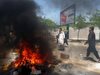 Най-малко 12 убити по време на погребение на загинал в протестите в Кабул