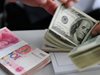Китайски финансов експерт: Тенденцията към дедоларизация ще продължи
