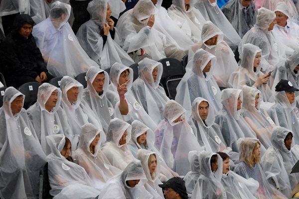 Rain wasn't part of the planned program, but it certainly didn't dampen the mood Photo: Reuters