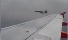 Военен изтребител съпроводи пътнически самолет след шега на тийнейджър за бомба (Видео)