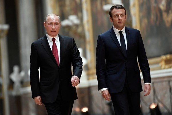 Владимир Путин и Еманюел Макрон СНИМКА: Ройтерс
