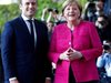 Меркел и Макрон обещаха да помогнат на 
Италия да се справи с кризата с мигрантите
