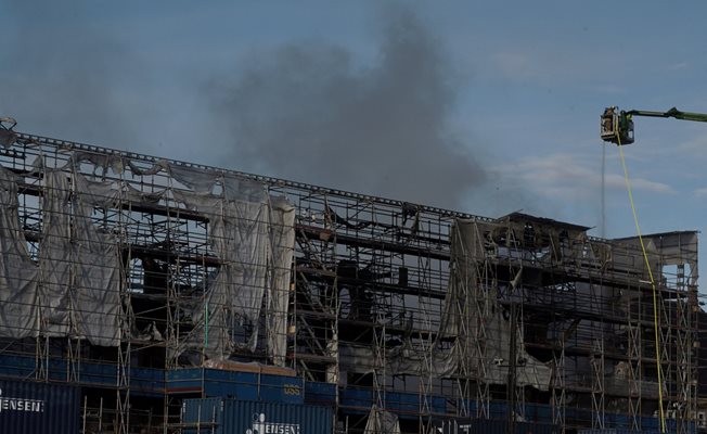 The facade of the burnt-out Copenhagen Stock Exchange partially collapsed PHOTO: Reuters