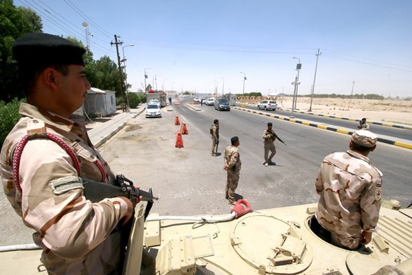 Войници на пост в Ирак Снимка: Ройтерс